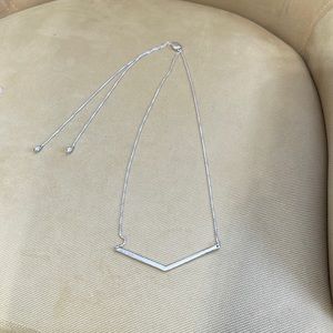 Reversible sliding clasp necklace